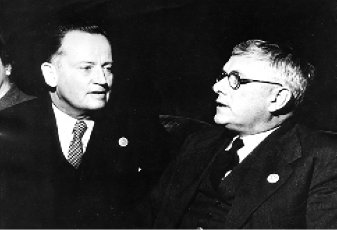 The Australian Deputy Prime Minister and leader of the Australian delegation, Francis Michael Forde (left), confers with the Australian Minister for External Affairs and Attorney-General, and deputy leader, Dr Herbert V Evatt, San Francisco Conference, April 1945. [UN Photo]