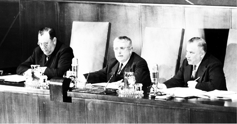President of UN General Assembly, the Australian Minister for External Affairs and Attorney-General, Dr Herbert V Evatt (centre), with UN Secretary-General Trygve Lie (left), and Executive Assistant to Secretary-General Andrew Cordier (right), addressing the opening of the second part of the Third Session, New York, 5 April 1949. [UN Photo]