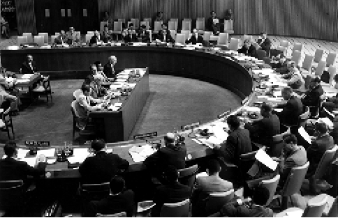The Australian Alternate Representative to the Trusteeship Council and counsellor, Australian Permanent Mission to the United Nations, Kevin T Kelly (upper right), addresses the Trusteeship Council, 1959. [UN Photo/Leo Rosenthal]