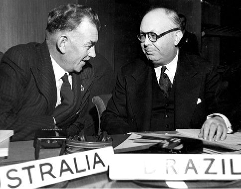 The Australian Minister for Defence and Post-War Reconstruction, JJ Dedman (left), and Ambassador João Carlos Muniz (Brazil) take their country's seats as newly-elected members (with Denmark and Poland) of the UN Economic and Social Council, New York, 4 February 1948. [UN Photo]