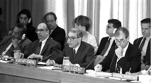 The Australian Permanent Representative to the United Nations, Richard Butler (right), presides in the Economic and Social Council during a discussion of the UN Secretary-General's report 'An Agenda for Peace', New York, 28 June 1993. Seated also (left to right): Under-Secretary-General for Policy Coordination and Sustainable Development Nitin Desai; President of the General Assembly SR Insanally (Guyana); and UN Secretary-General Boutros Boutros-Ghali. [UN Photo]