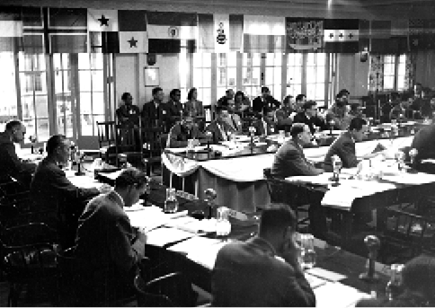 Delegates attend one of the sessions at the UN Economic Commission for Asia and the Far East meeting, Lapstone, New South Wales, 1948. [Department of Foreign Affairs and Trade]