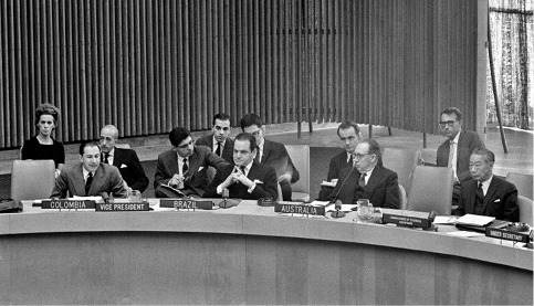 The Australian Ambassador to Paris, Dr E Ronald Walker (second right), attends the opening of the 33rd session of the UN Economic and Social Council as Australia's representative, New York, 3 April 1962. Left to right: First Vice-President Dr Alfonso Patiño Roselli (Colombia); Geraldo de Carvalho Silos (Brazil); Walker; and the UN Commissioner of Technical Assistance, Victor Hoo. [UN Photo/MB]