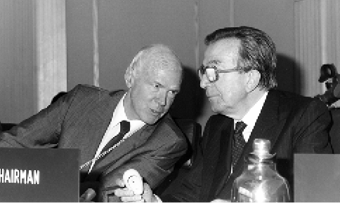 The Australian Executive Director of the World Food Programme from 1982 to 1992, James C Ingram (left), discusses a point with the Italian Foreign Minister and former prime minister, Guilio Andreotti, at a meeting marking the twenty-fifth anniversary of the program, Rome, 30 May to 10 June 1988. [James Ingram]