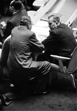 The Australian Permanent Representative to the United Nations, Dr E Ronald Walker (left), consults with the Canadian Secretary of State for External Affairs, Lester B Pearson, during the emergency special session of the UN General Assembly on additional plans for UNEF I, New York, 7 November 1956. [UN Photo/AF]