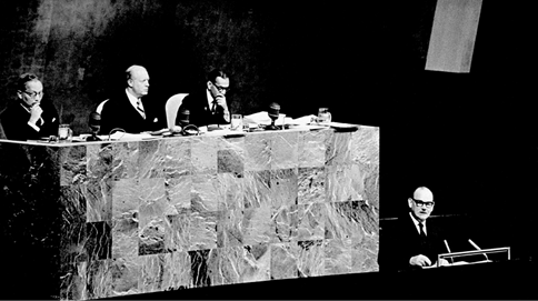 The Australian Minister for External Affairs, Paul Hasluck, addresses the General Assembly, New York, 9 October 1968. On the rostrum (left to right): UN Secretary-General U Thant; Iceland Permanent Representative to the United Nations Hannes Kjartansson; and UN Under-Secretary, General Assembly Affairs, CV Narasimhan. [UN Photo/National Archives of Australia]