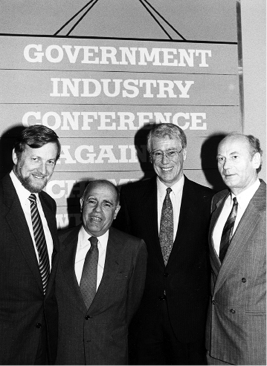 The Australian Minister for Foreign Affairs and Trade, Gareth Evans (left), hosts the Government–Industry Conference against Chemical Weapons, Canberra, 18 to 22 September 1989. Left to right: Evans; the head of the Brazilian Delegation for Disarmament and Human Rights, Ambassador Marcos de Azambuja; the President of the Chemical Conference of Australia, Tom Reynolds; and the Manager, Pesticide Production, Bayer AG, Dormagen, Dr H Schroeder. [Department of Foreign Affairs and Trade]