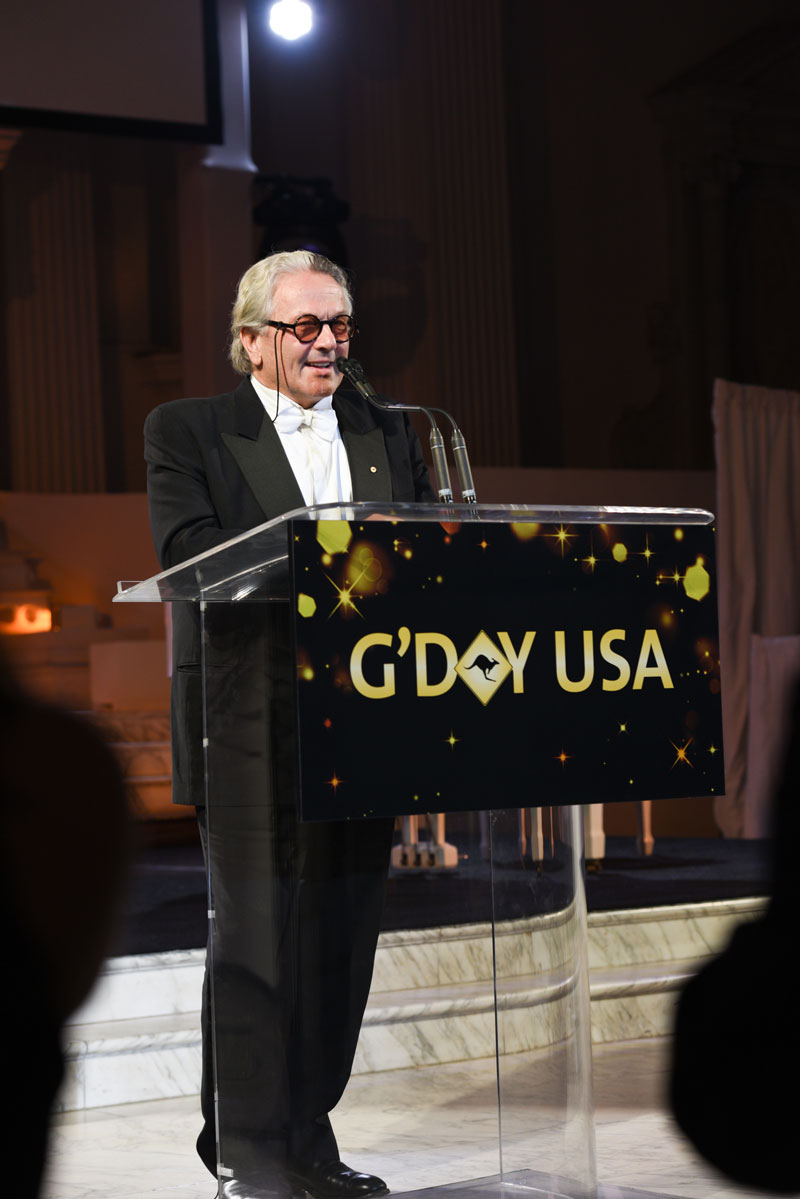 George Miller standing at a podium