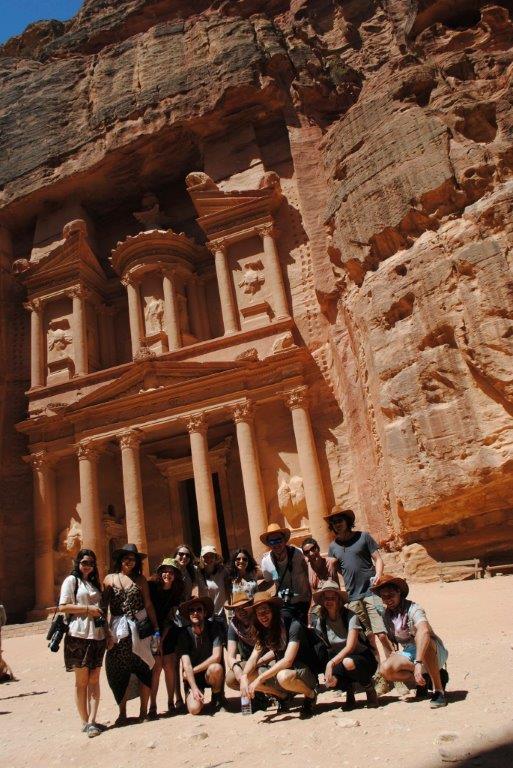 group of students in front of building