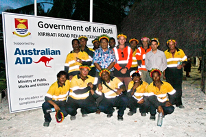 Photo of Hon Kirabuke Teiaua with the roads construction team