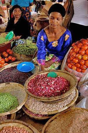 Women selling produce at markets in Malawi