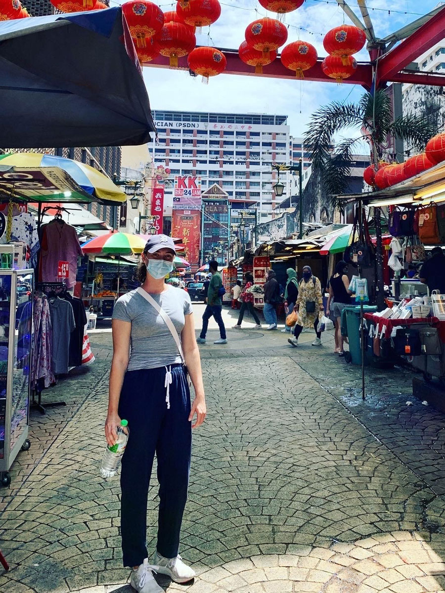 Photo of Adelaide Pope exploring Malaysia's street markets.