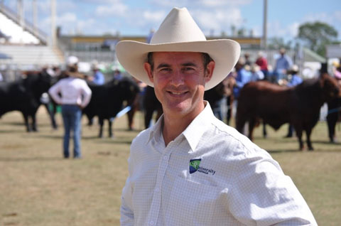 Professor Dave Swain standing infront of cattle