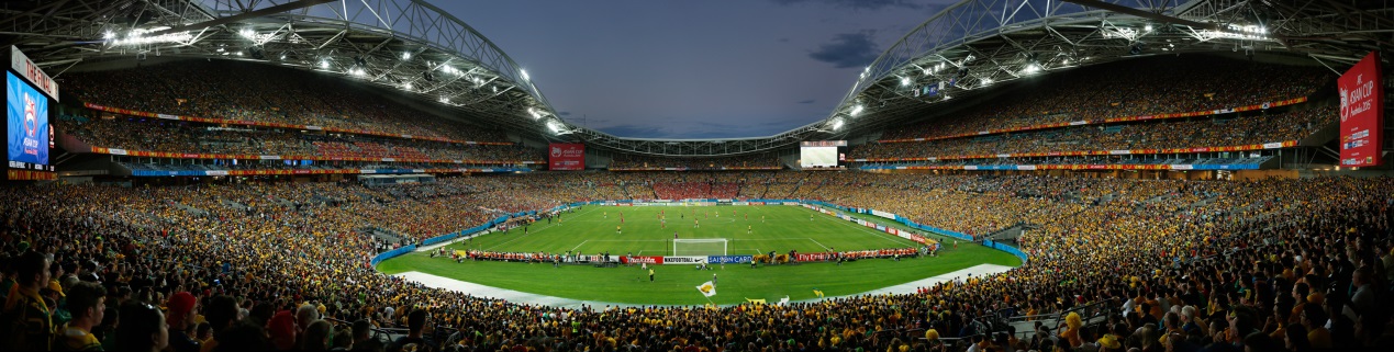 wide lens photo of the ANZ stadium at night