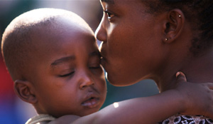 Woman talking to community health worker