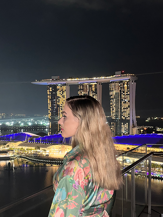 Amelia in front of the Marina Bay Sands in Singapore.
