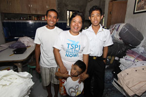 Photo of Corazon Bautista, her husband Felix, and their sons, Eugene and Jacob