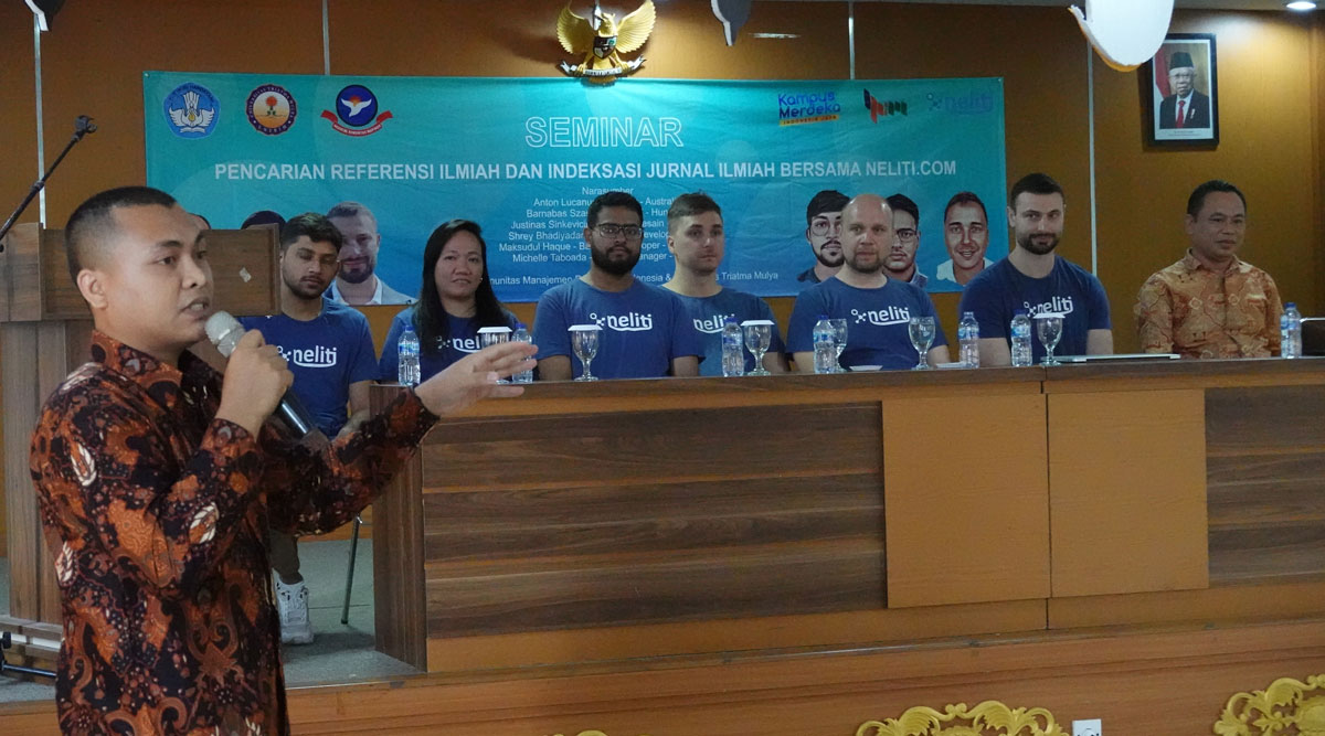 Anton in a panel with the Neliti team at an Indonesian university.