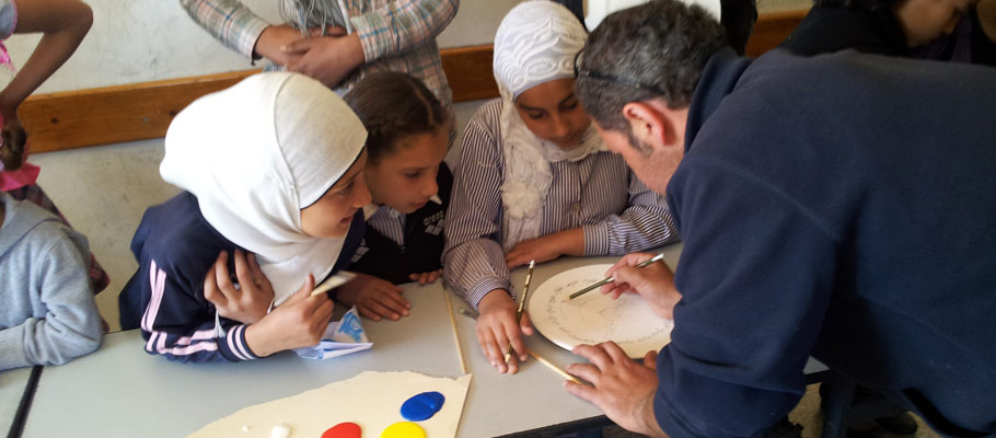 Children at one of the art workshops for children at remote West Bank schools