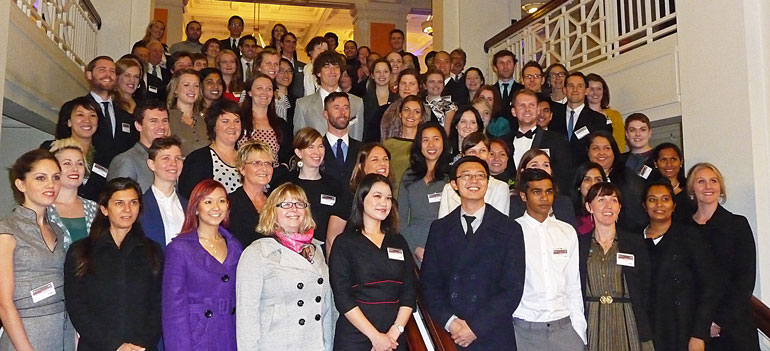 Large group of people standing on internal stairs in Old Parliament House