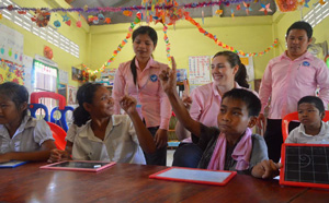 Children and teachers in a classroom