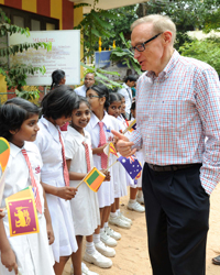 Photo of Senator Carr greeting staff and students at St Anthony's school