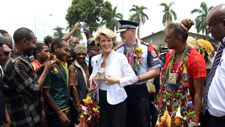 Photo gallery: Julie Bishop greets vendors and customers at Lae Market, Papua New Guinea, during a walking tour with officers from the Australian Federal Police and the Royal Papua New Guinea Constabulary.