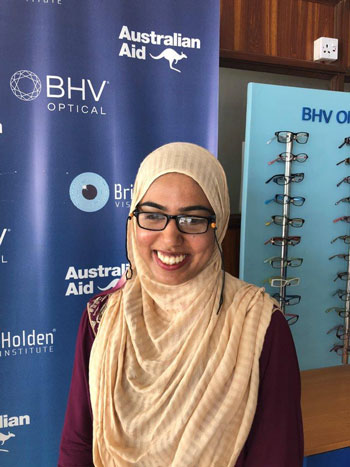 Photo of Amna on computer
