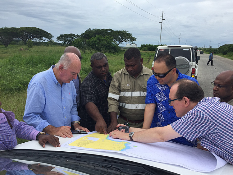 Australian and PNG officials explore options for the landing site for the telecommunications cable from Australia to PNG. Caution Bay, PNG.