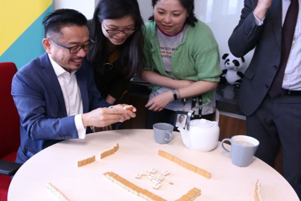People playing Mah-Jong
