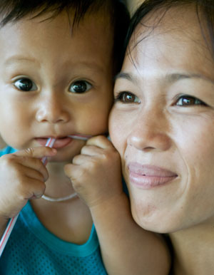 A mother and child in a remote village in Koh Kong province, south-west Cambodia