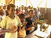 Children singing in classroom