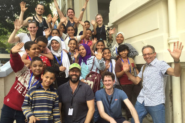 Group photo of Shaun Parker & Company dancers with Ambassador Neil Hawkins.