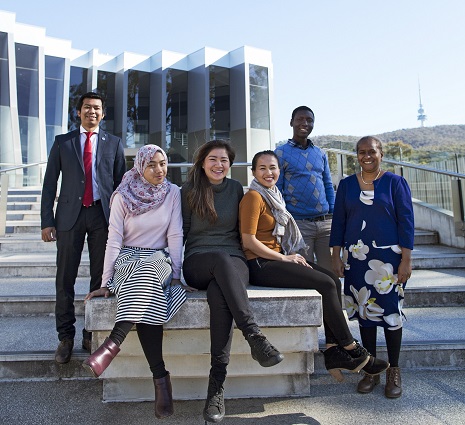 Conference members outside a building in Canberra