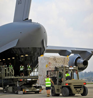 A plane being loaded with emergency supplies