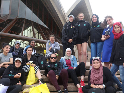 Group photo of delegates infront of Sydney Opera House