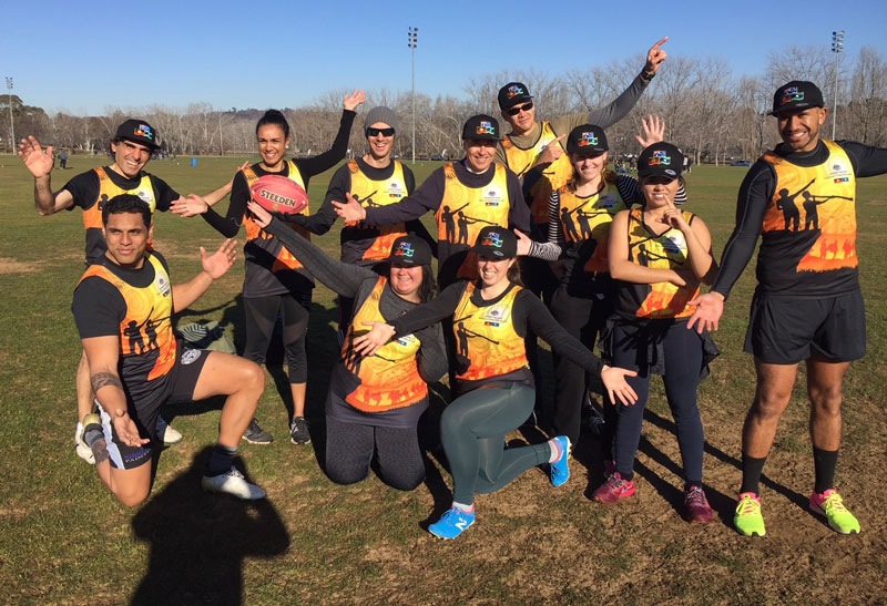 Group photo of DFAT’s 2018 NAIDOC Touch Footy Team in DFAT's Indigenous Jersey's.
