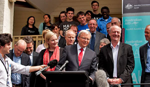 Mr Rudd speaking at launch with Ms Smyth and Mr Costello at his side.
