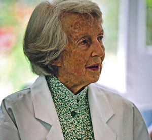 Photo of Dr Hamlin sitting in a chair looking to her left
