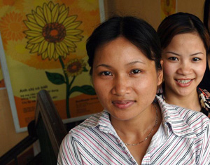 Two women smiling at the camera