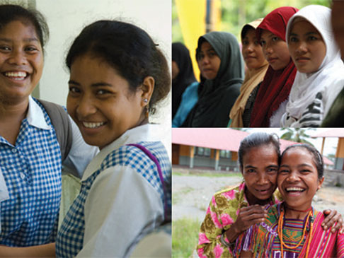 Women and girls smiling
