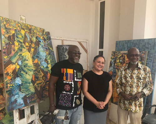 Lee-Ann posing for a photo with twp african artists.