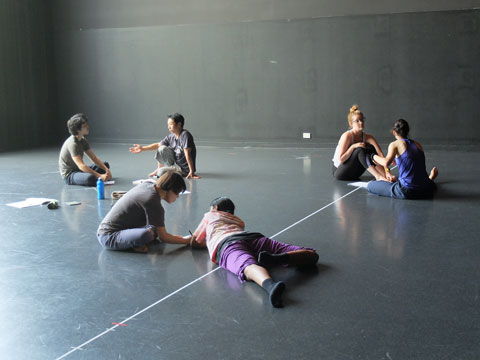 performers rehearsing in a studio