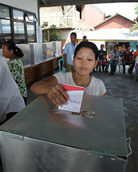 woman voting in Indonesian election
