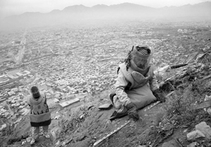 Two men in mining protection gear working near Kabul, Afghanistan