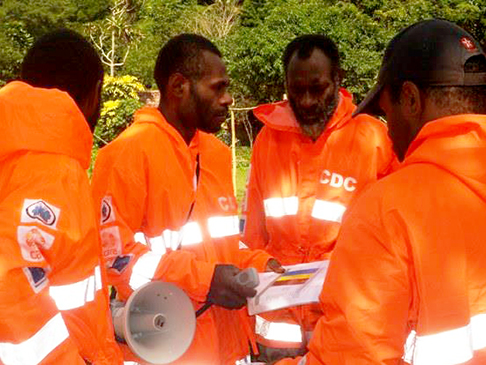 Community Disaster Committee members taking part in a simulation activity