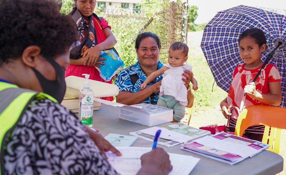 Photo of family using a mobile clinic.