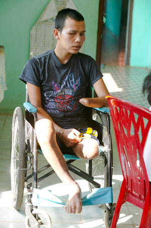 Landmine survivor in wheelchair