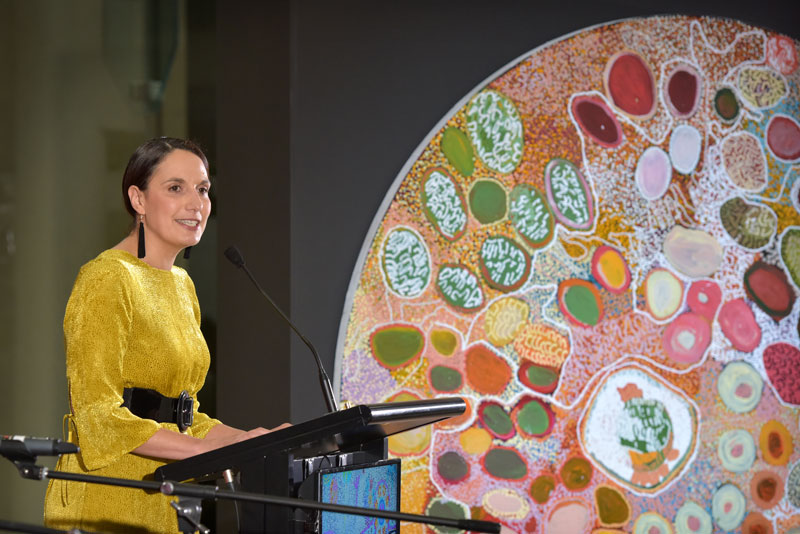 Photo of Lou-Ellen Martin speaking at the Songlines Art Exhibition.