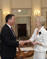 Photo of Richard Marles shaking hands Governor-General Quentin Bryce
